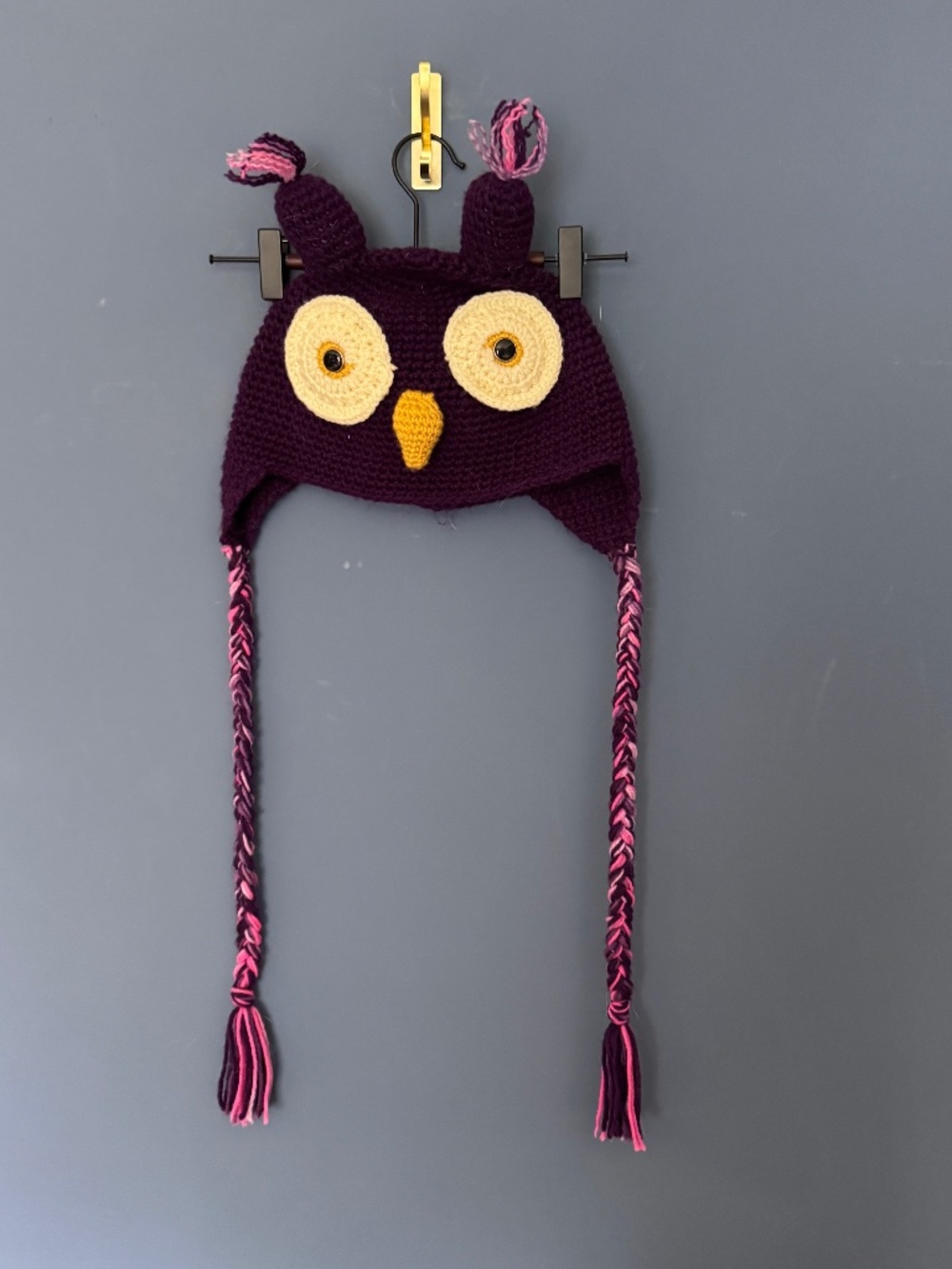 Adult Handmade dark purple crochet owl hat featuring braided side tassels